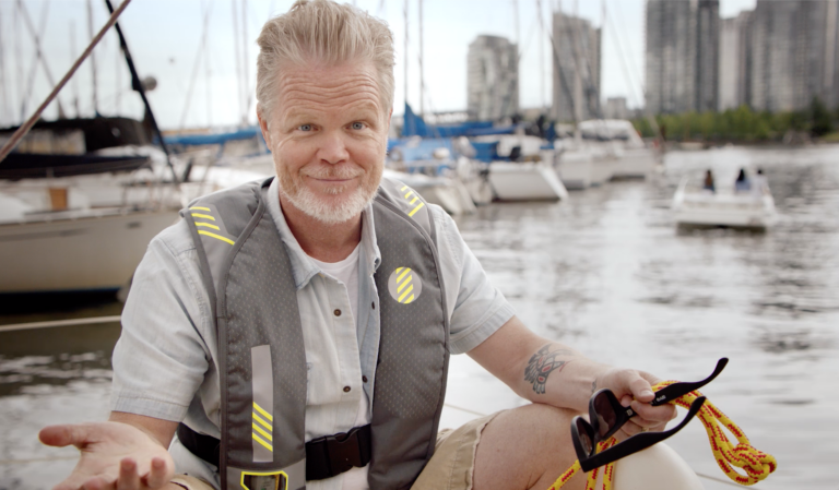 Man on a boat wearing a lifejacket